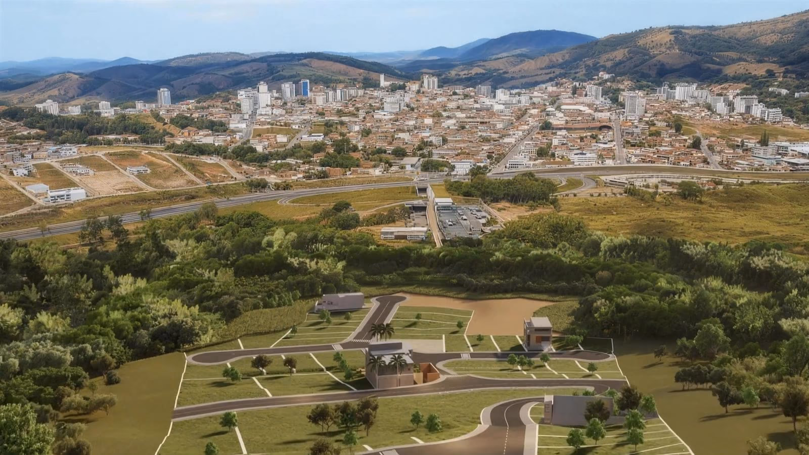 Vista aérea de um empreendimento da Evolua com a cidade ao fundo, em Minas Gerais